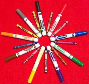 Crayola markers and crayons in circle