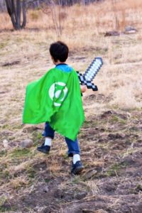 Boy in Green Lantern cape