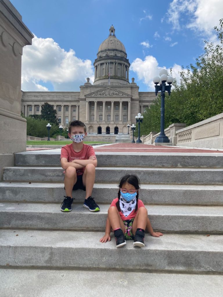 masked kids at KY state Capitol
